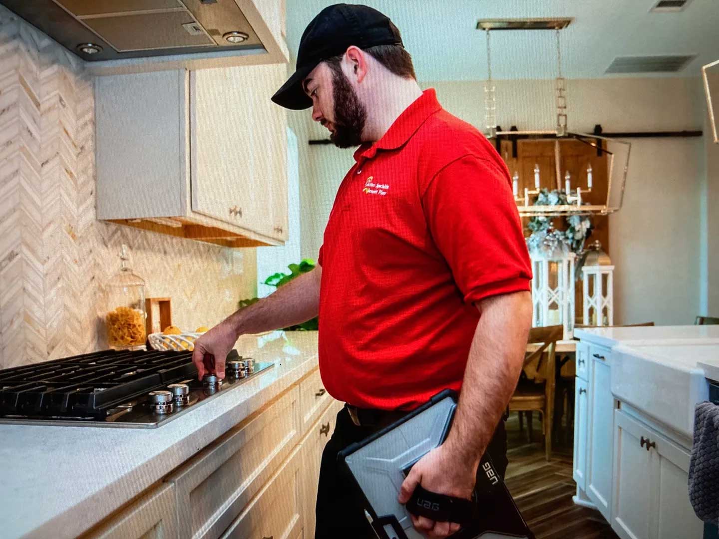 man inspecting kitchen